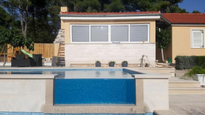 Seaside family friendly house with a swimming pool Cove Smokvina, Brac - 18003